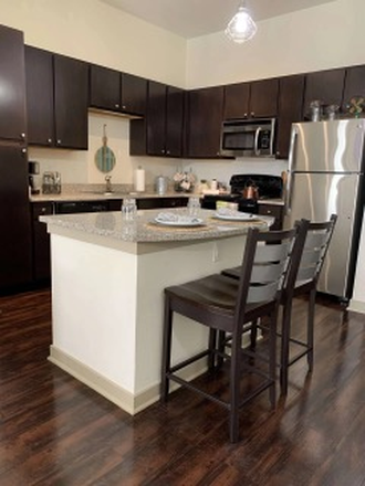 Kitchen in the same except laid out for 2b 2b - University House 1b Available in a 2b 2b move in available right now!