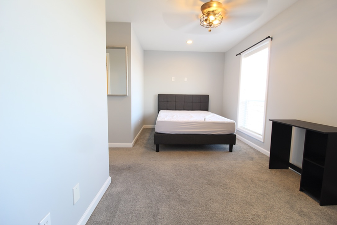 Bedroom - Furnished 2 bedroom - 2 bathroom condo! Pre-leasing for the 26-27 school year!