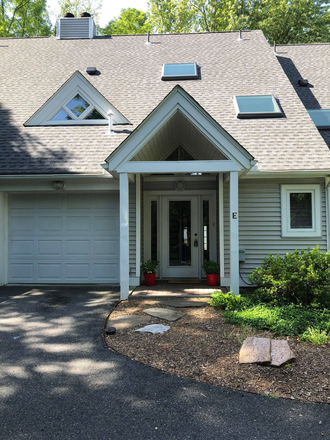 Front door and garage - Large bedroom available in condo walking distance from UMass campus