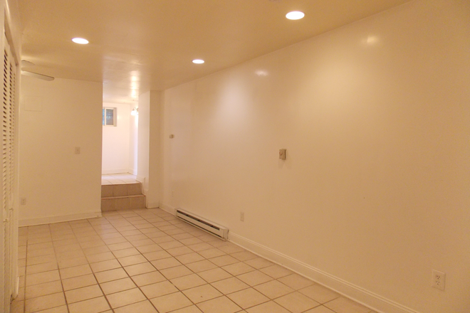 Entry and Living Area - 2 bedroom apartment close to Homewood campus