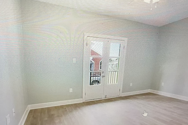 front bedroom - Open Plan 2BR/2BA in Historic Neighborhood with Modern Comforts! Duplex
