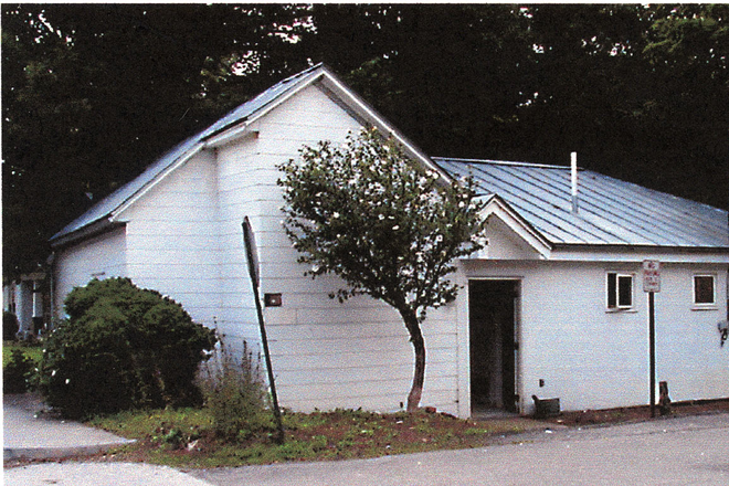 Outside street view - House for Rent with original log cabin.