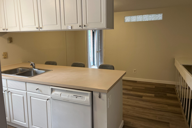 New Dishwasher not shown - End Unit at College Townhomes = BONUS window in Kitchen + 3 HUGE Closets