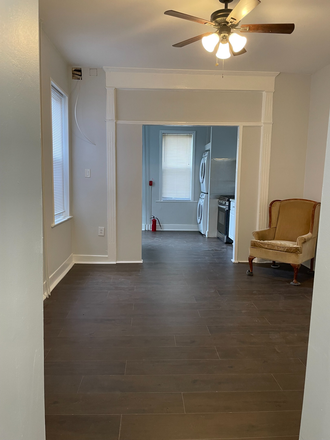 View of livingroom and kitchen - Beautiful newly renovated 1 bedroom with backyard near Italian Market Apartments