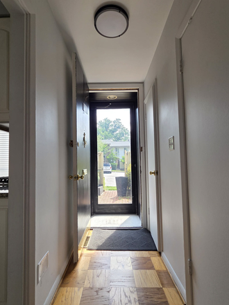 Entrance (first door on right is to guest bath, second is shoe closet) - 1BR/1.5BA ($1,600) or 2BR/2.5BA ($3,200), Furnished for Professionals, Grad Students Townhome