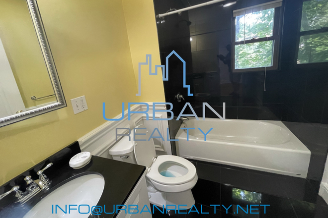 BATHROOM - RENOVATED 2 BED 1 BATH DIRECTLY ACROSS THE STREET FROM BC CAMPUS AVAILABLE AUG 1ST Apartments