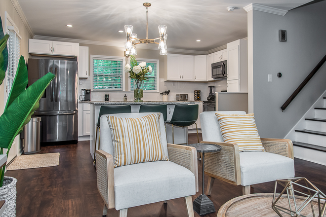 living room and kitchen - 4 bedroom Furnished Home with Fenced Yard 7 minutes from Duke Campus