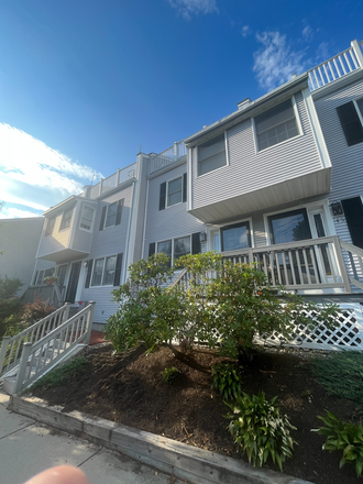 front of home - 3 Bed 2.5 Bath W/ In-Unit Laundry and Parking Available 9/1! Townhome