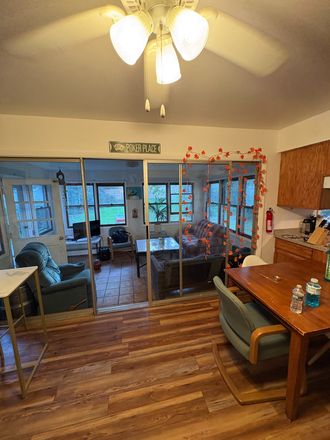 Kitchen looking into sunroom and the backyard - 🏡 Spring 2027 UVM Sublet Available | Large Bedroom | Great Location | Active House