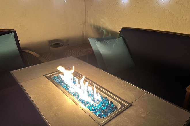 Relax by Fire pit and Bistro Lights - 3 Block Walk to Campus - Quiet Furnished 2 Bedroom/1.5 Ba Condo with parking for 1 car