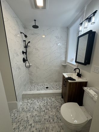 Hub Realty - Mission Hill, Sunny front facing 2 bedroom with brand new kitchen and bathroom, on green line T Apartments
