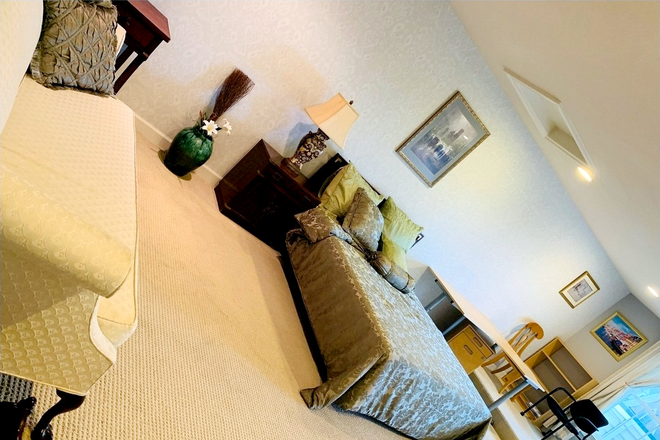 Master Bedroom : Includes private bathroom and an oversized walk-in closet. Furnishings are as shown in the photos. Monthly Rent: $1,400 - GBS Luxury master bedroom with private bathroom and balcony, and parking space, $1400/month. Townhome