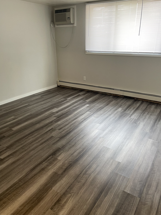 Living Room - 2BRs Now Leasing for August 2025 Near Bus Route Apartments