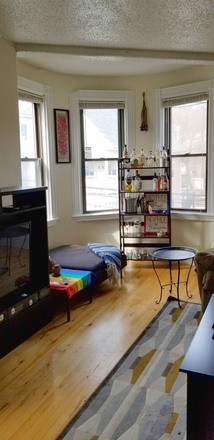 Turret area of living room - 3 Bedroom Top Floor with Laundry Available 9-1 Triplex
