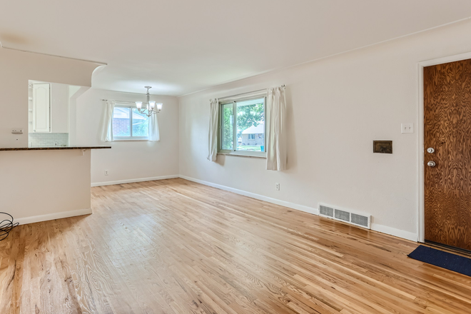 Open Living/Dining - Walk to Anschutz Campus: Massive 4 BR/2 BA home with 2 Private Studies and a 2.5 car garage