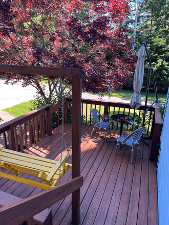 Deck from side kitchen door - 2026-2027 three bedroom two bath house only 20 minutes to URI.