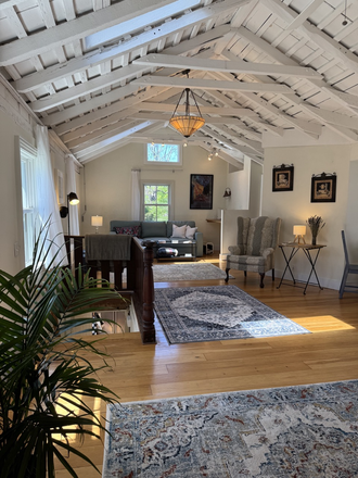 Upstairs Family / Reading Room. Sunny and bright w bookshelf, Queen Anne reading chair; also table in nook for puzzles or working, 500 sqfr - Furnished 3BR home-Mountain Ave-Princeton