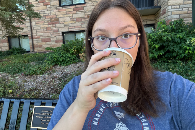 me drinking coffee - U Club Apartments