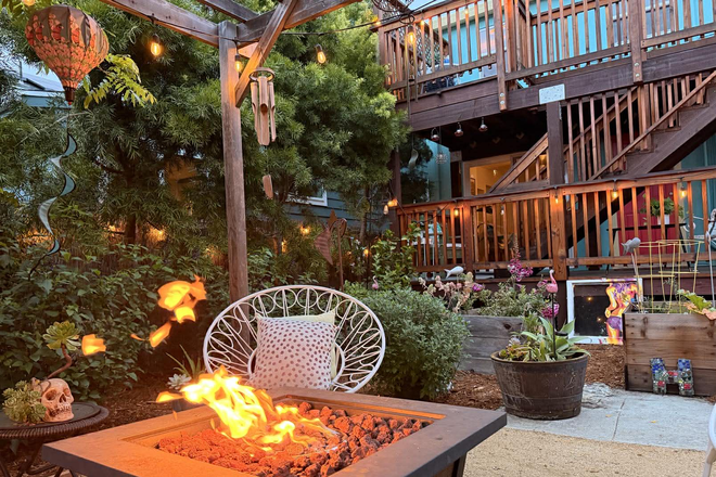 cozy outdoor fire pit - Magical Urban Oasis