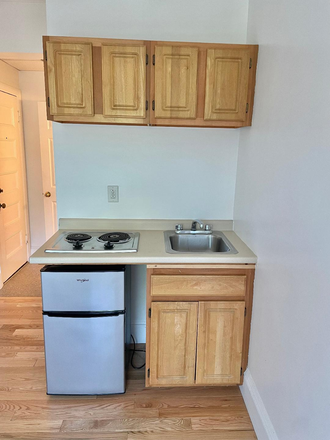 KITCHENETTE - NO BROKER FEE - RENOVATED STUDIO WITH HARDWOOD FLOORS AT 1061 BEACON STREET AVAILABLE NOW Apartments
