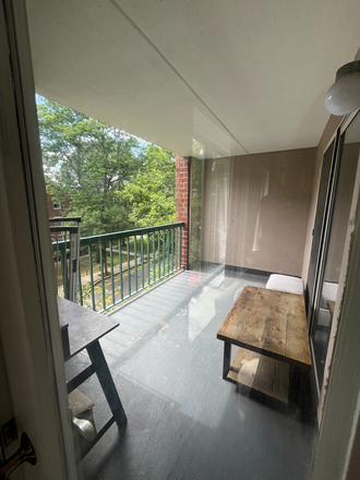 Balcony (table is a friend's and will be gone soon) - Harbor Point on the Bay Apartments