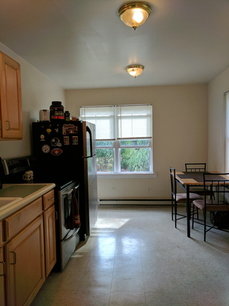 Eat in Kitchen - Spacious & quaint, one bedroom apartment in quiet community 6 miles from campus