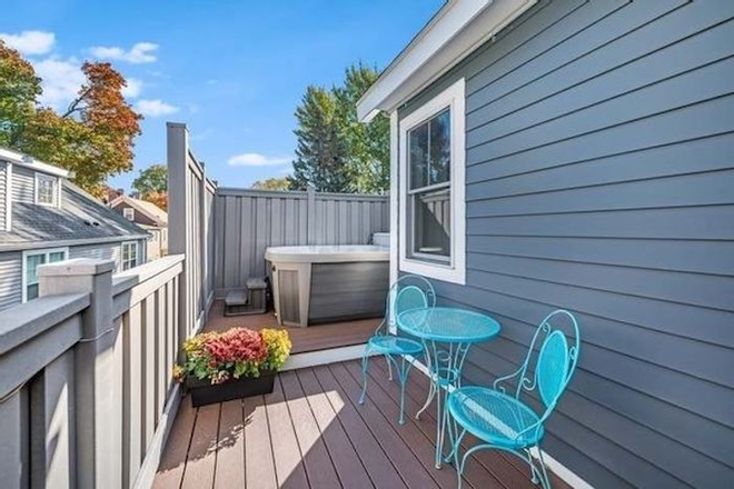 Private deck on the 3rd floor with private hot tub. - Three Story Furnished Townhouse for Families w/ private everything, close to Harvard/Tufts/MIT