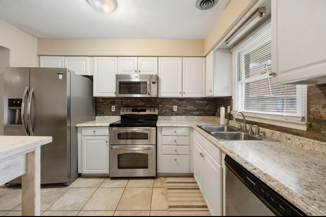 Kitchen - Super Affordable Condo, walk to campus, free assigned parking, 3 Large Br, 2 Bath, Utilities Inc