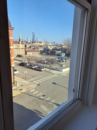 Skyline from bedroom 1 - EFFICIENT NEW 2 BEDRMS 1 FULL BATH PILSEN Apartments