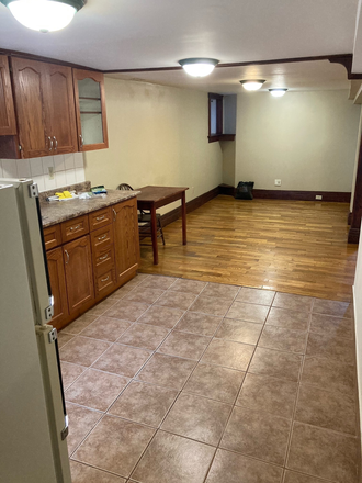view of kitchen/dining/living area - Bright and Spacious 1 Bedroom Basement Apartment in Little Italy