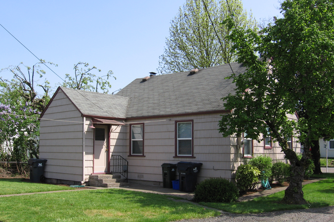 Outside East - Charming three bedroom two bath house on direct bus line to U of O.