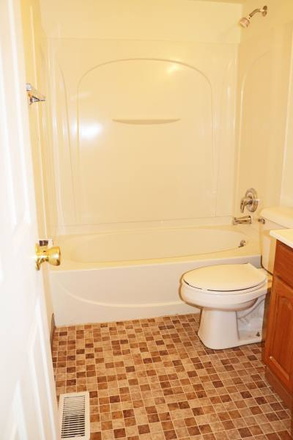 Bathroom - includes tub - 1-Bed Near Campus (Highland) Apartments