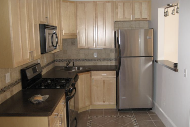 Kitchen - 4 bed/ 1 bath available 09/01. Close to public transportation Apartments