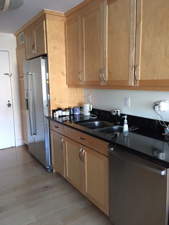 Kitchen - Spacious 2BR/2BA Condo Near Woodley Park Metro – Ideal for GW Hospital Staff.
