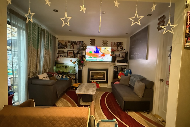 Living room - Comfortable Room with Patio Access Townhome