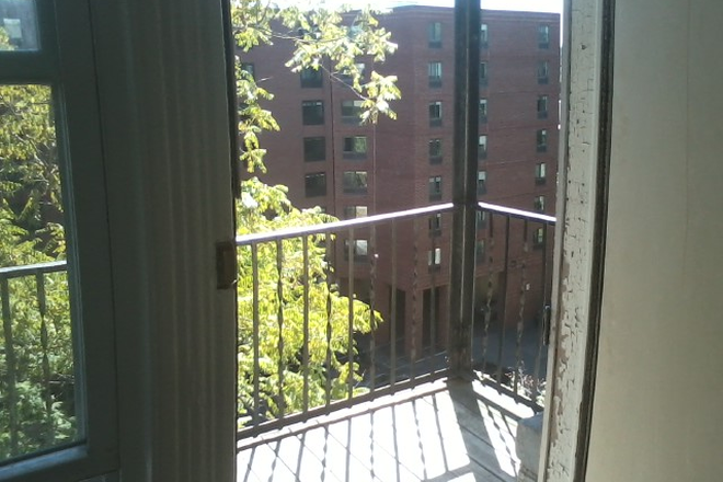 visit hubrealtyproperties.com - Brighton, huge 2 bedroom with eat in kitchen and deck, on green line T Apartments