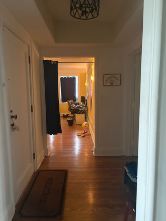 The foyer. The front door is on the left and the front bedroom is straight ahead. - Cedar Glen Apartments