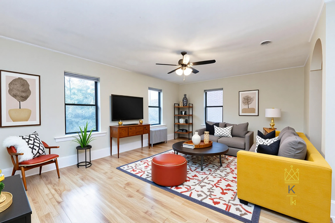 living room - Sunny 2 bed /2 bath in Brookline with roof deck - landlord pays the fee! Apartments