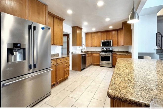 Granite Counters, Stainless Steel Appliances, Updated Lighting and Tons of Cabinet Space! - Great Corner Lot with Private Yard House