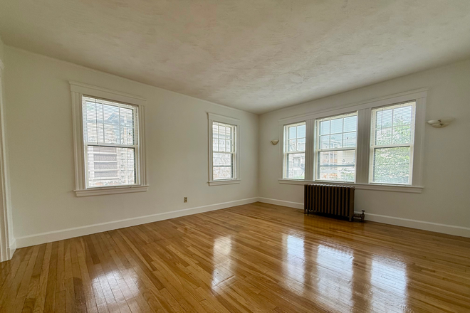 Living Room - East Watertown Spacious 2 bed 1 bath Apartments