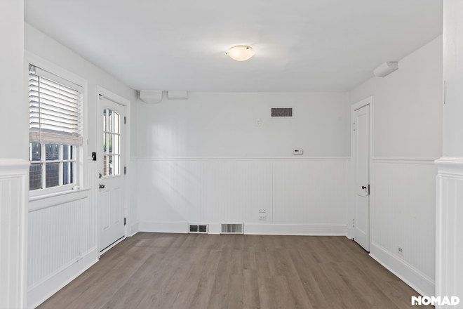 Living Room - Spacious 2BR Basement Apartment in Prime Durham Location — Half Block from Duke East Campus