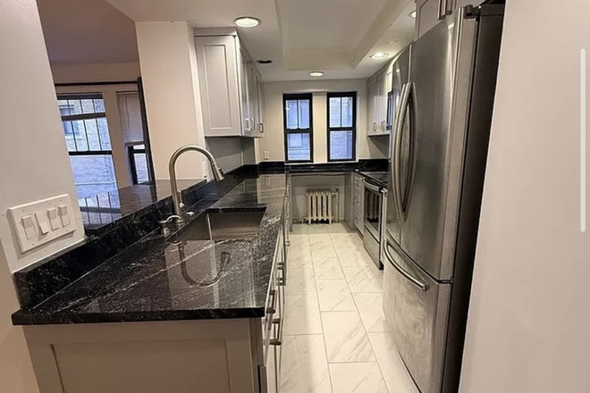 living - LOCATION!! BEAUTIFUL 4 BED 2 BATH, HEAT/HOT WATER INCLUDED! 9/1/26!!