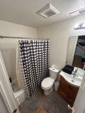 downstairs bathroom - 5 min walk to campus, fenced in backyard, parking spot on side of house