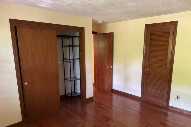 Bedroom and Closet - Malden Apartment 1 Bed / 1 Bath Includes: Parking, Laundry, Deck, Fireplace, Dishwasher/Disposal