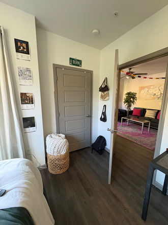 Walk in closet, looking out to living room - YOUnion Apartments