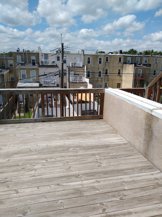 3rd floor deck - One furnished bedroom with wifi and utilities included  at Johns Hopkins Hospital Townhome