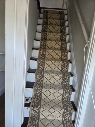 Inside apartment stair case. - Conveniently located to the bus line, train station. Off street parking and close to shopping center Apartments