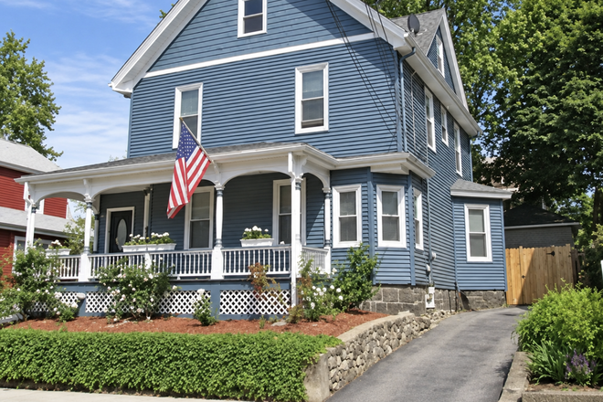 Front of house - **HUGE 6 Bedroom/2ba House No Fee- updated, big yard, free laundry & parking**