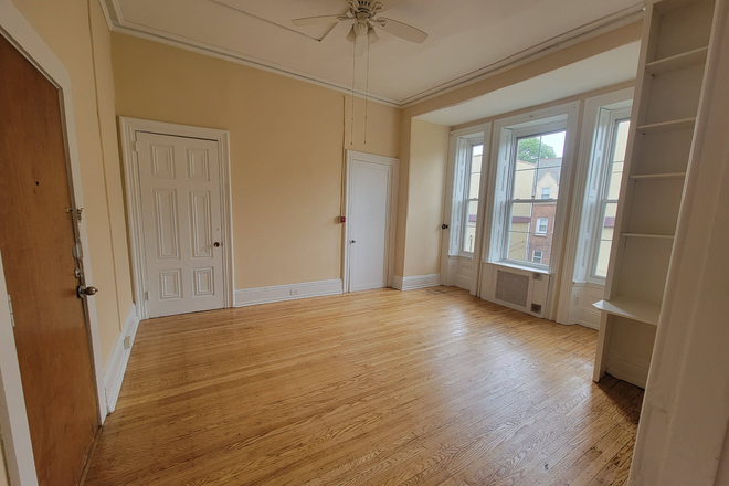 Living Room - 4039 Baltimore Avenue Apartments