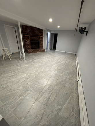 Living room - Private Corner House with Ample Parking.  Quiet neighborhood.